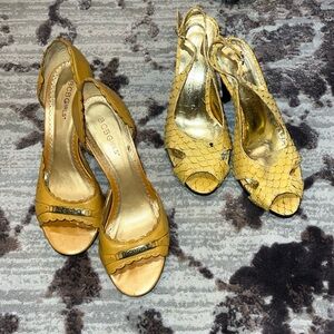 Two pairs adorable yellow shoes